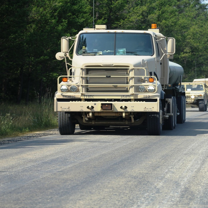 armored convoy trucks desert